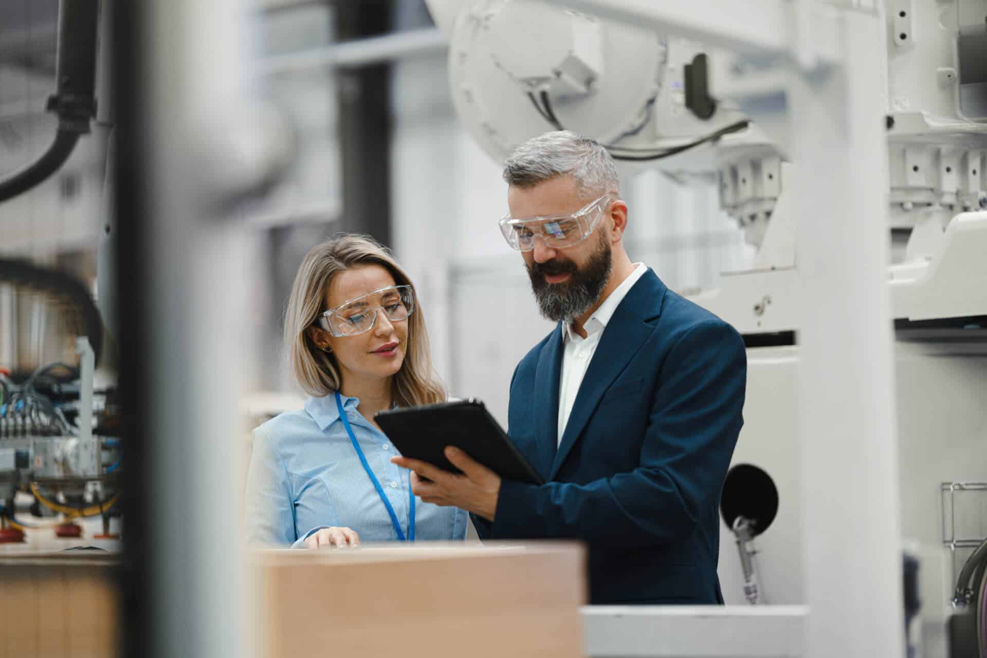 female engineer male supervisor standing modern ameristrong